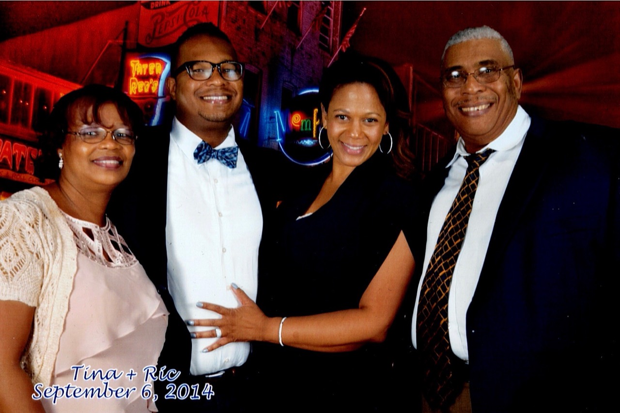 Richard and family dressed up together at a celebration